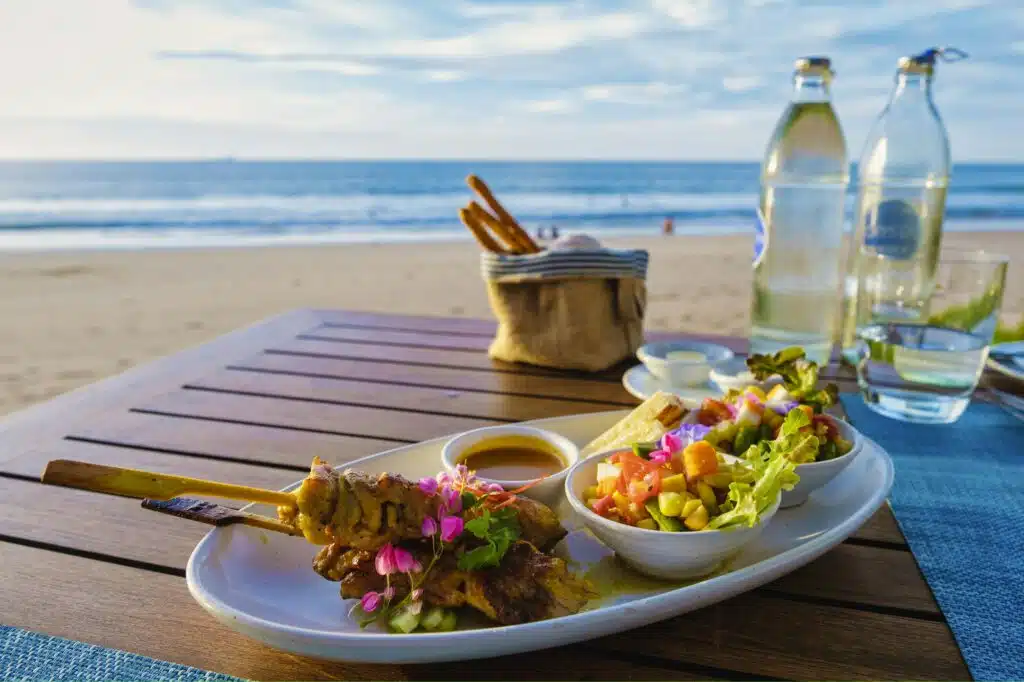 Thai food on a table on the beach in Thailand Thai sate